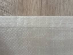 The bag is woven polypropylene